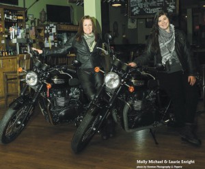 Laurie and Molly stand beside their Triumph   Bonneville T100 Blacks (photo courtesy of  the Warrenton Lifestyle Magazine article)