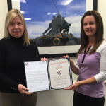Robin Palli (left) received an  Award of Excellence from Team Lead, Dawn Petruzzello