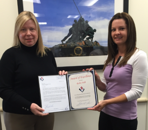 Robin Palli (left) received an  Award of Excellence from Team Lead, Dawn Petruzzello