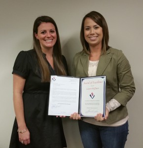 Megan Shelton (left) recognized Lauren Hoffman  for her commitment to excellence.