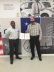 Team member, Haywood Rumsey (left), presented Scott Gebhardt with an Award of Excellence.