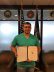 Kenneth Stephens displays his Award of Excellence