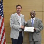 Shane Moore poses with Jerome Fletcher at the first Vets 2 Vets Coaching Seminar.