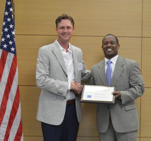 Shane Moore poses with Jerome Fletcher at the first Vets 2 Vets Coaching Seminar.