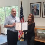 VMSI COO, Ken Konkol,  recognizes Amanda Leal