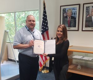 VMSI COO, Ken Konkol,  recognizes Amanda Leal