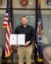 Jacob Richardson with an Award of Excellence from VMSI.