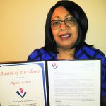 Agnes Lewis with her award.