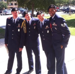 Jeremy Morris, while serving in the U.S. Air Force (second from left).