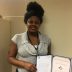 Amber Washington receives an Award of Excellence.