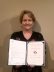 Celeste Norman with her Award of Excellence.