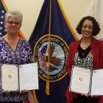 Dana Ebersole and Magdaline DeSousa with their Awards of Excellence.