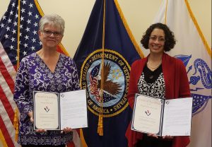 Dana Ebersole and Magdaline DeSousa with their Awards of Excellence.