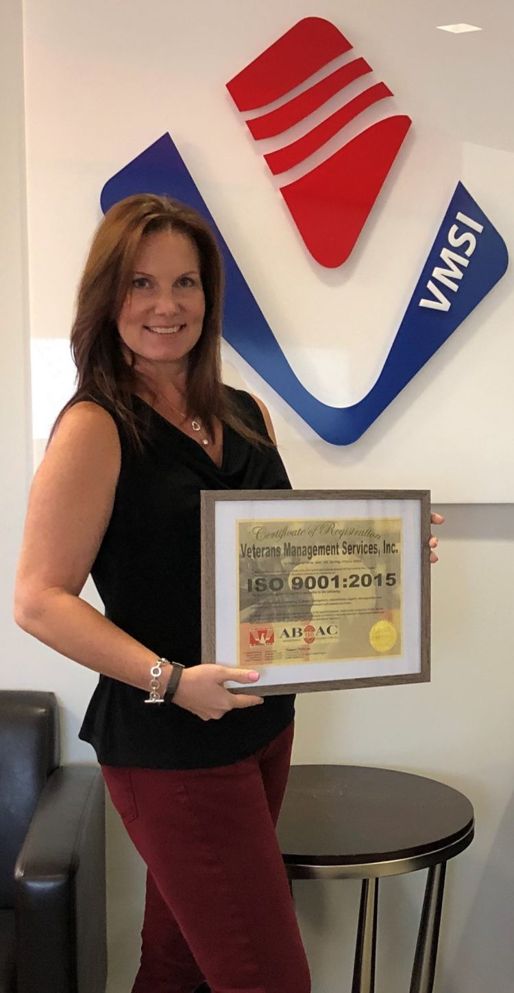 Paige Meade with VMSI's
ISO 9001:2015 Certificate