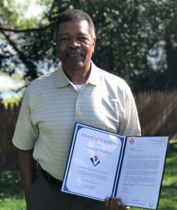 Ted Wallace with his Award of Excellence.